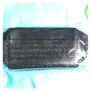 Tarte black with gold glitter makeup bag